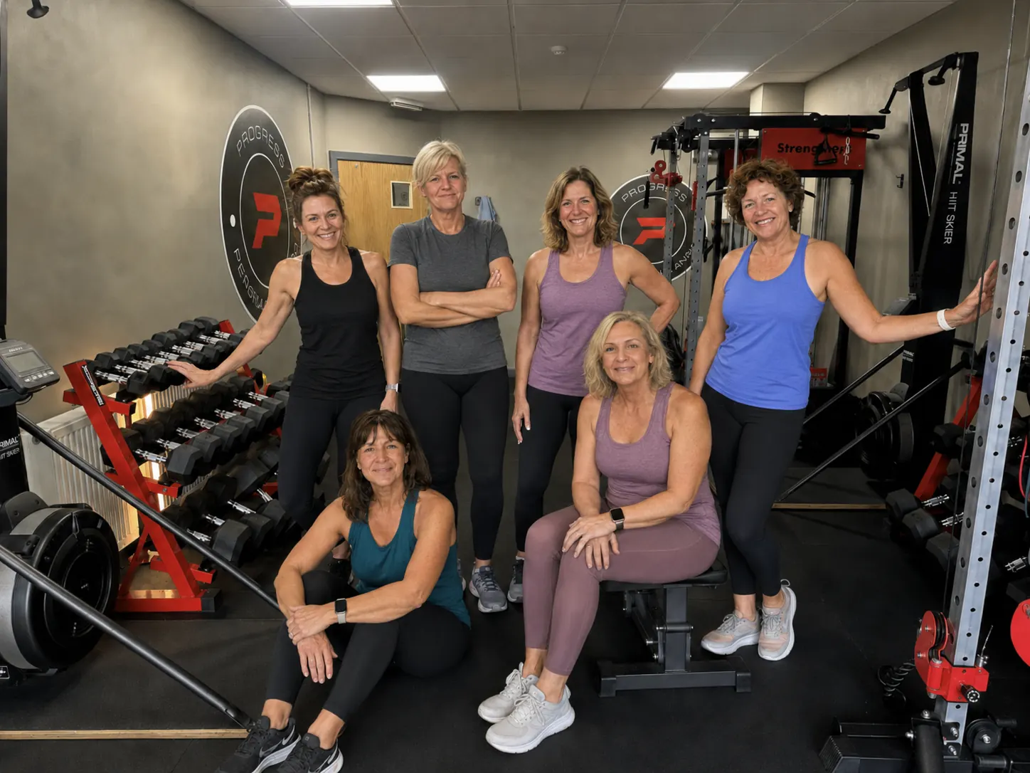 Group of women in their 40s training together at Progress Fitness